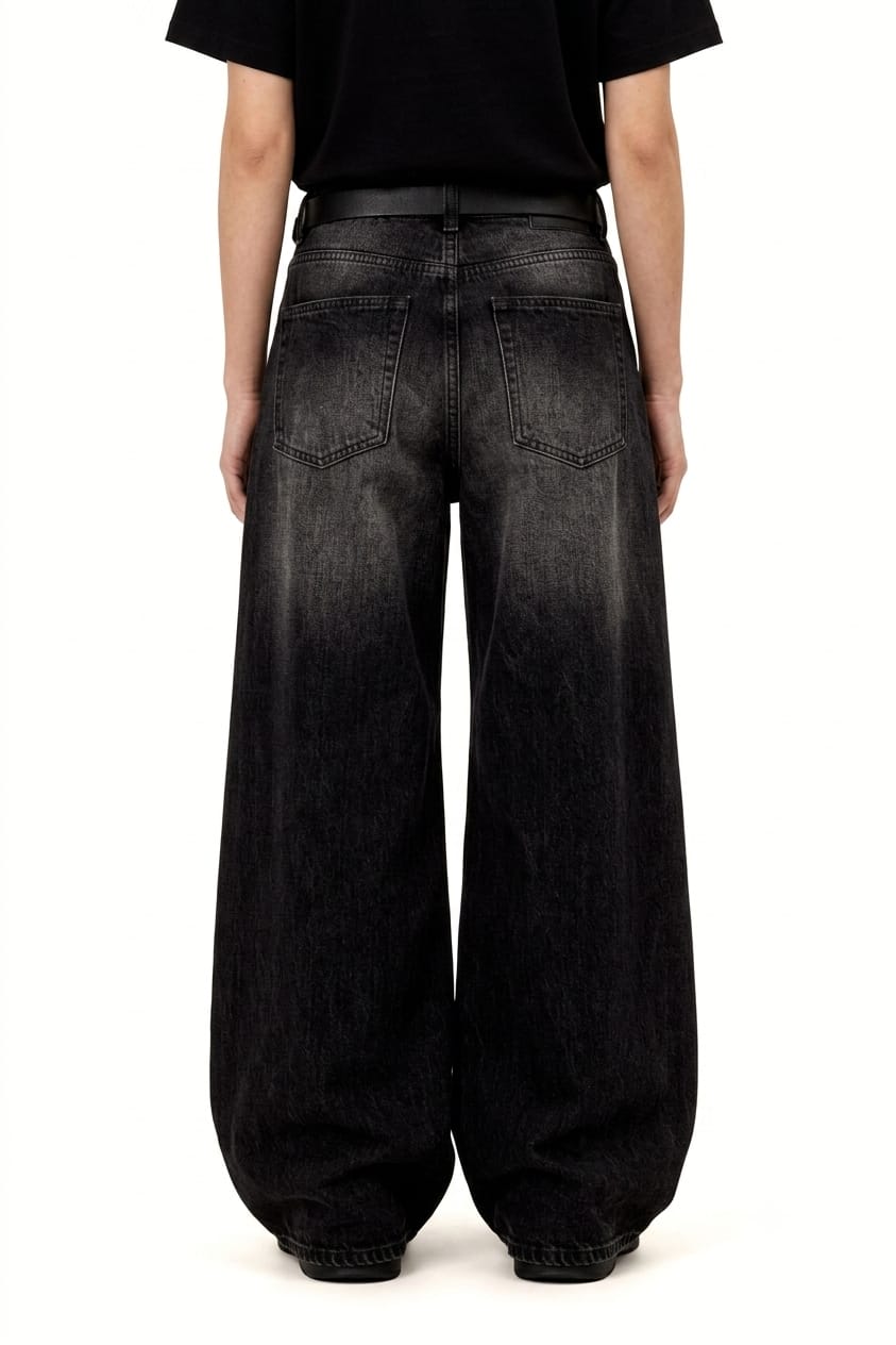 Oversized baggy jeans, denim wash detail close-up
